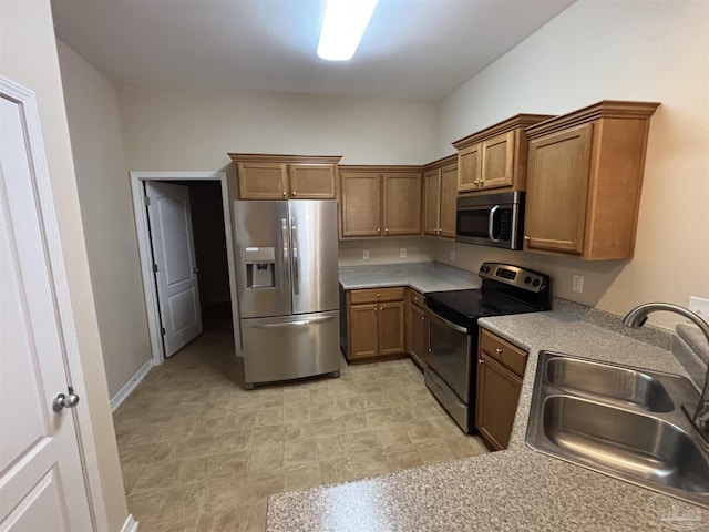 kitchen with sink and stainless steel appliances