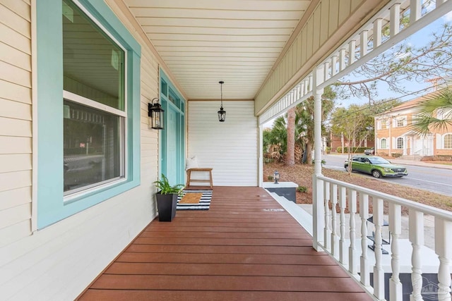 wooden deck featuring covered porch