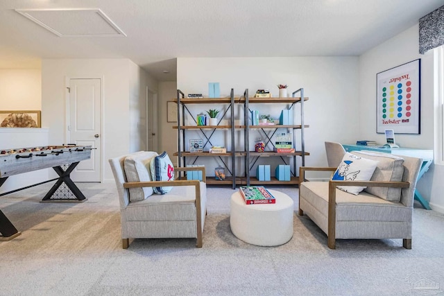 living area with carpet flooring
