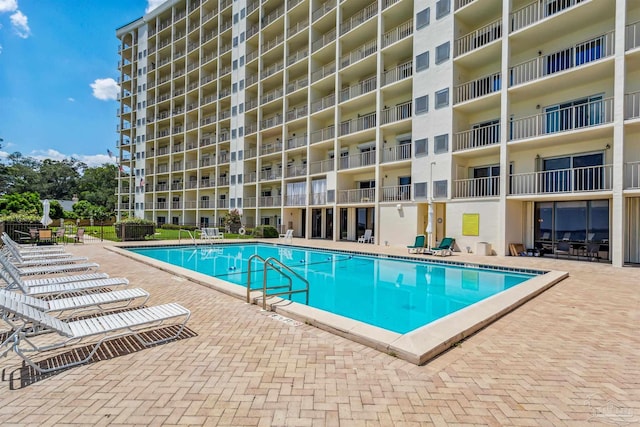 pool with a patio