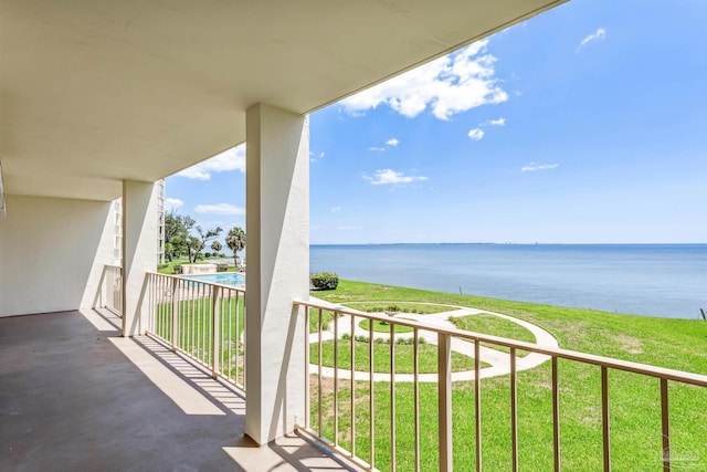 balcony featuring a water view