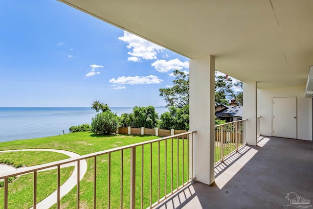 balcony featuring a water view