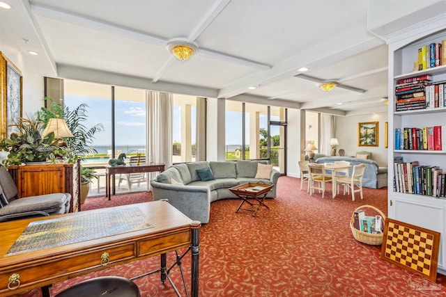 sunroom / solarium featuring beam ceiling, plenty of natural light, and a water view