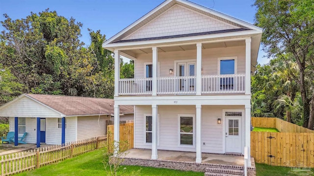 view of front of home with a balcony