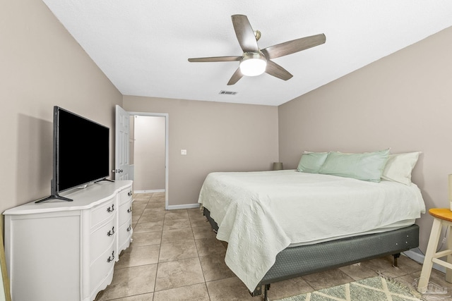 bedroom featuring ceiling fan and light tile patterned floors