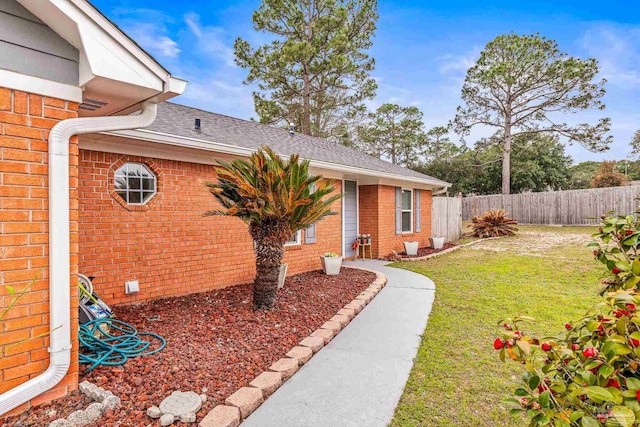 exterior space with a lawn