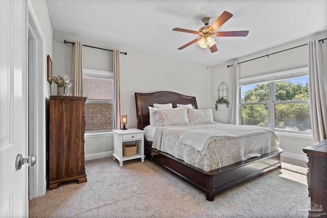 6347 Ladera Trl, Pace, FL 32571 - bedroom featuring baseboards, carpet flooring, and ceiling fan