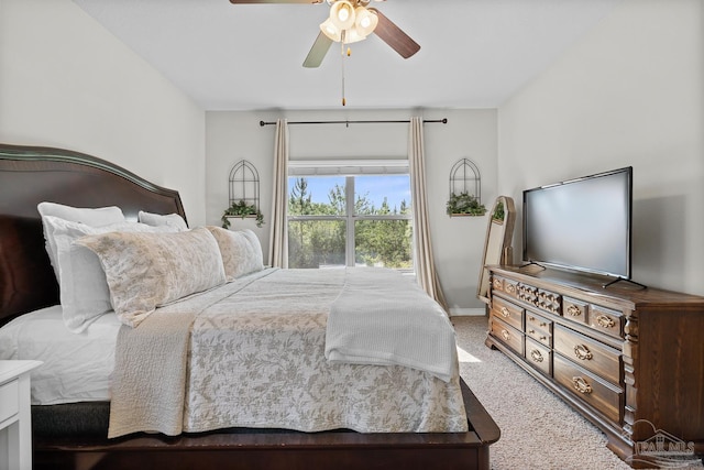 6347 Ladera Trl, Pace, FL 32571 - bedroom with light colored carpet, baseboards, and a ceiling fan