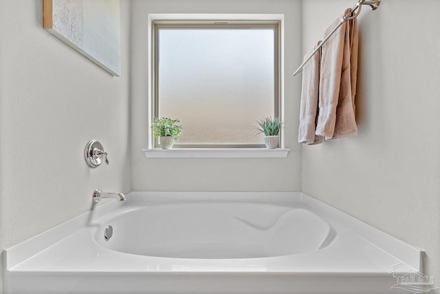 6347 Ladera Trl, Pace, FL 32571 - bathroom with a bath and healthy amount of natural light