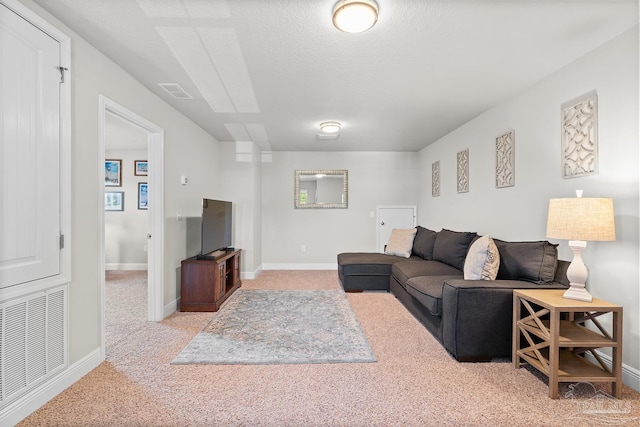 6347 Ladera Trl, Pace, FL 32571 - living area featuring carpet flooring, baseboards, and a textured ceiling