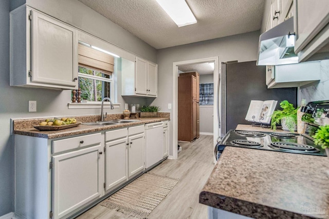 kitchen featuring white cabinetry, sink, and stainless steel appliances