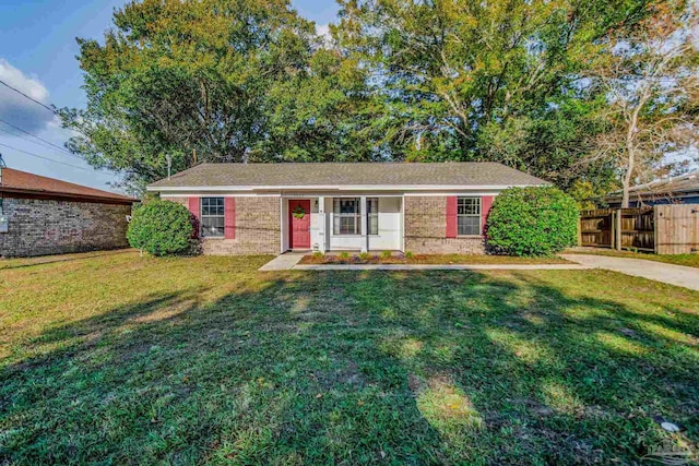 single story home with a front lawn