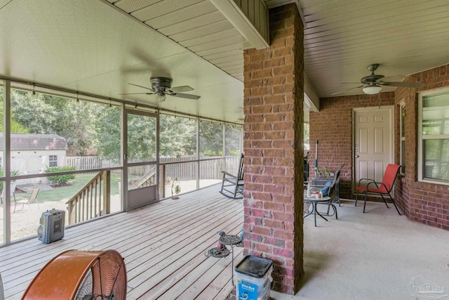 exterior space featuring ceiling fan