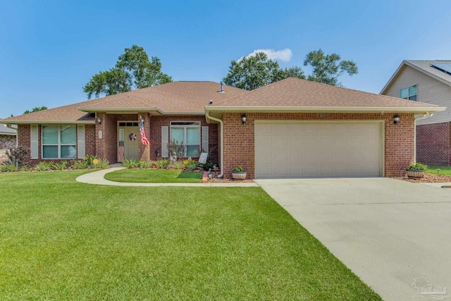 single story home with a garage and a front yard