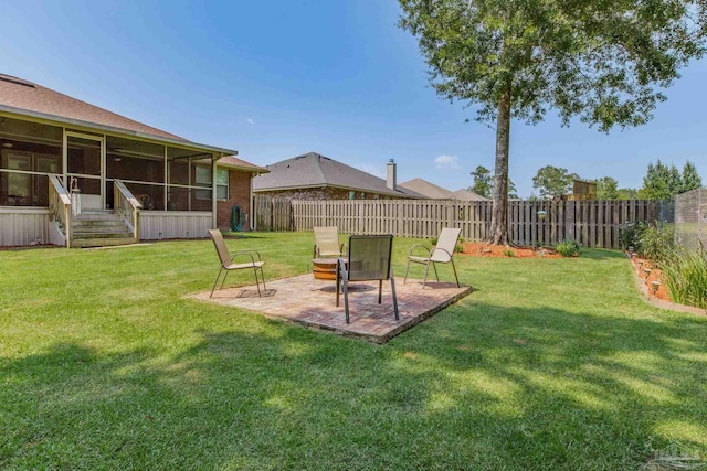 view of yard with a patio and a sunroom