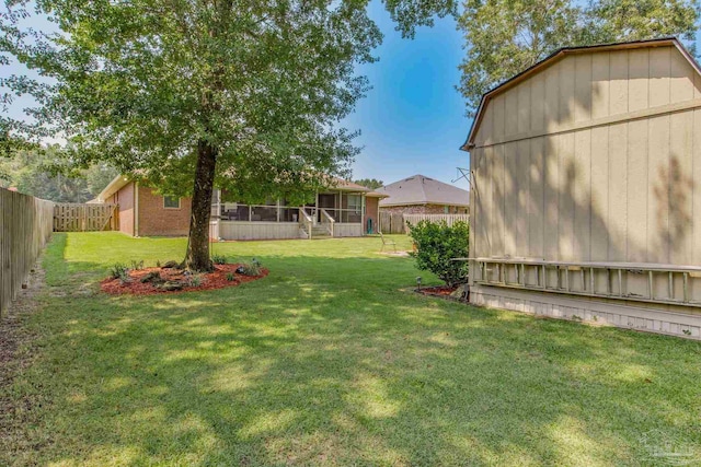 view of yard with a sunroom