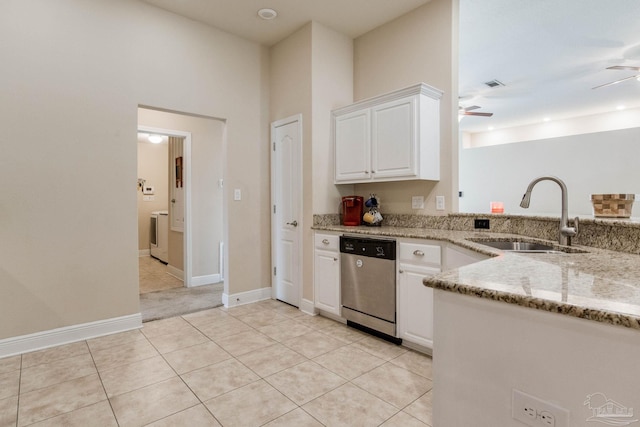 kitchen featuring dishwasher, ceiling fan, white cabinetry, and sink