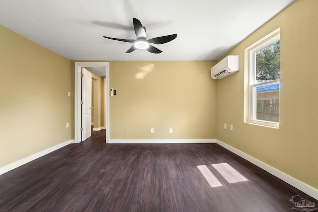 unfurnished room featuring dark hardwood / wood-style flooring, a wall mounted AC, and ceiling fan