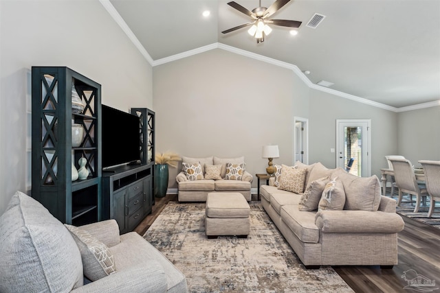 living room with ceiling fan, dark hardwood / wood-style flooring, lofted ceiling, and ornamental molding