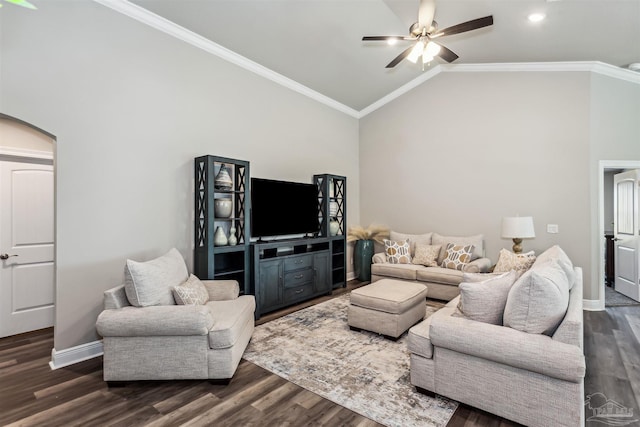 living room featuring ceiling fan, high vaulted ceiling, dark hardwood / wood-style floors, and ornamental molding