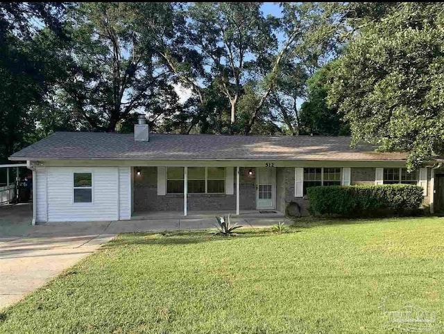 single story home with a front lawn