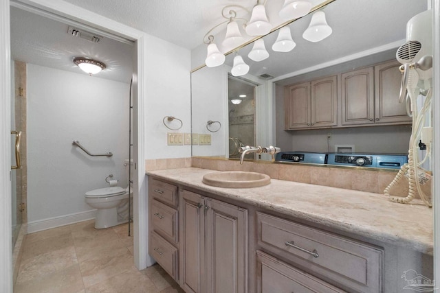 8520 Gulf Blvd Unit 23, Navarre Beach, FL 32566 - bathroom with vanity, toilet, baseboards, tile patterned flooring, and a shower