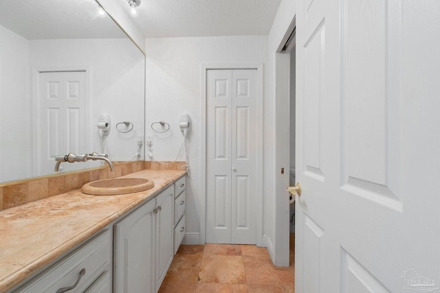 8520 Gulf Blvd Unit 23, Navarre Beach, FL 32566 - bathroom featuring vanity and a closet