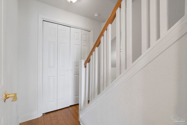 8520 Gulf Blvd Unit 23, Navarre Beach, FL 32566 - foyer entrance with wood finished floors and stairway