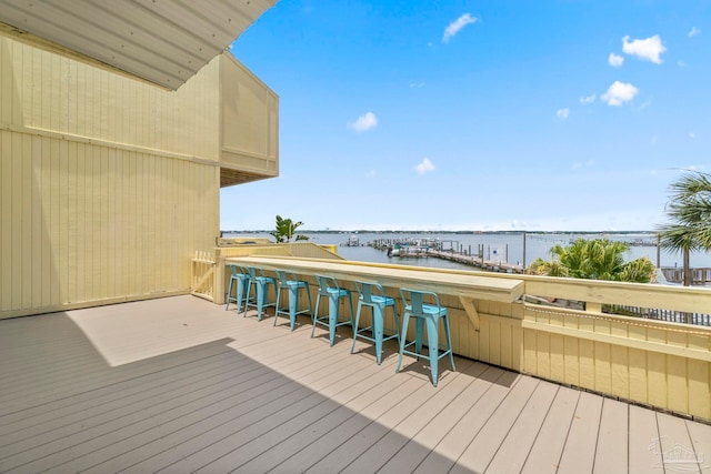 8520 Gulf Blvd Unit 23, Navarre Beach, FL 32566 - wooden terrace featuring a water view