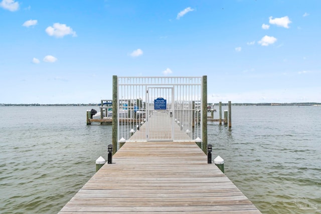 8520 Gulf Blvd Unit 23, Navarre Beach, FL 32566 - dock area featuring boat lift and a water view