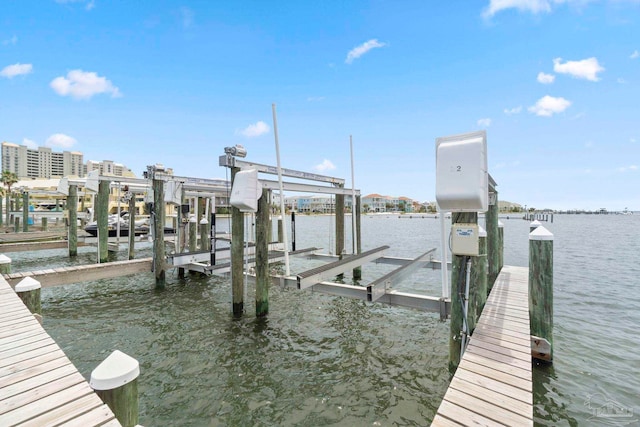 8520 Gulf Blvd Unit 23, Navarre Beach, FL 32566 - dock area with boat lift and a water view