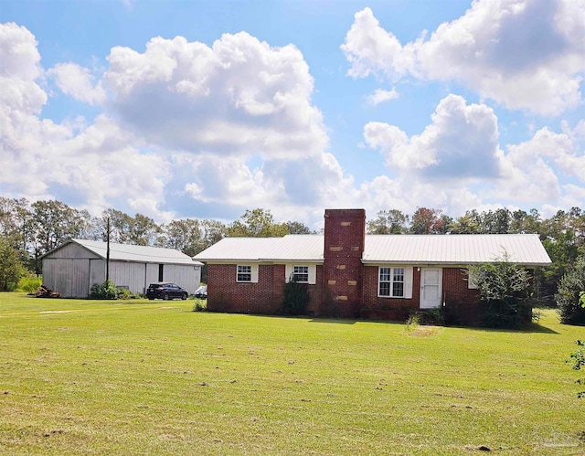 exterior space featuring a front lawn