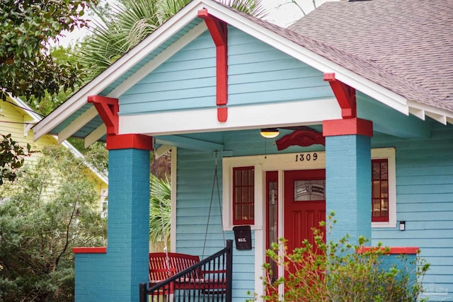 entrance to property with covered porch