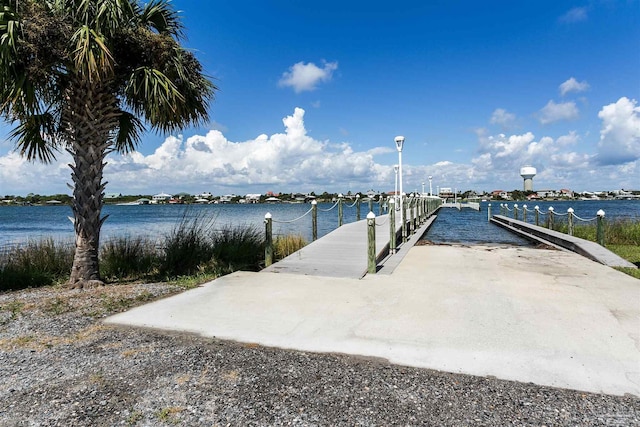 dock area featuring a water view