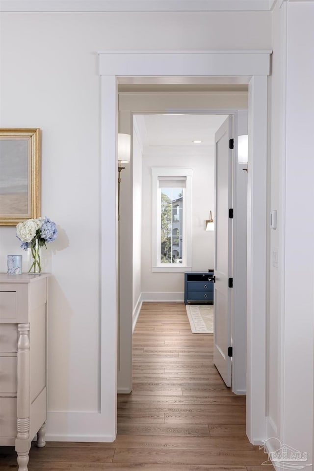 hallway featuring light hardwood / wood-style flooring