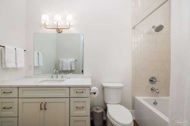 full bathroom with toilet, vanity, and shower / tub combo with curtain