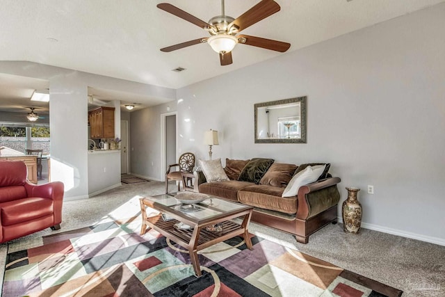 living room featuring light carpet and ceiling fan