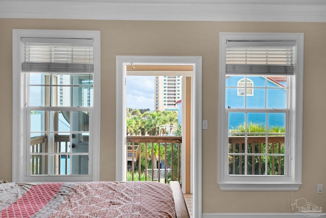 unfurnished bedroom featuring crown molding