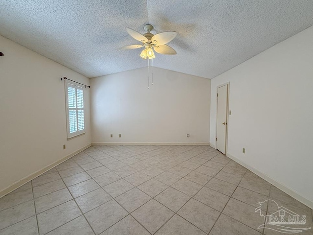 4514 Southpointe Ln, Pensacola, FL 32514 - empty room with ceiling fan, light tile patterned floors, a textured ceiling, vaulted ceiling, and baseboards