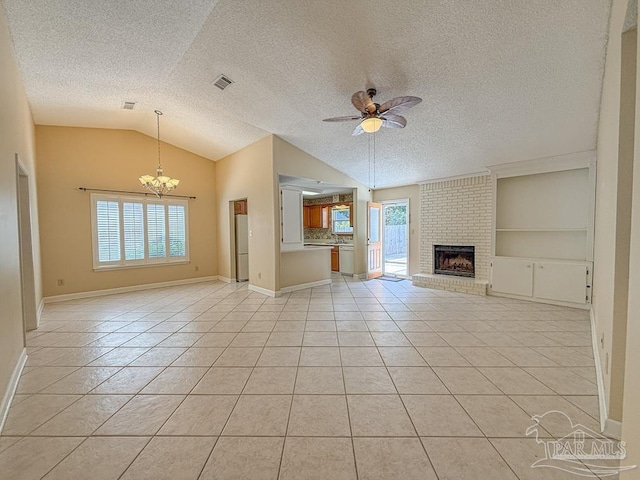 4514 Southpointe Ln, Pensacola, FL 32514 - unfurnished living room with plenty of natural light, a ceiling fan, vaulted ceiling, a chandelier, and light tile patterned floors