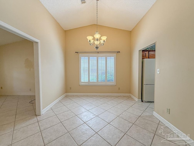 4514 Southpointe Ln, Pensacola, FL 32514 - unfurnished room with light tile patterned floors, a chandelier, lofted ceiling, a textured ceiling, and baseboards