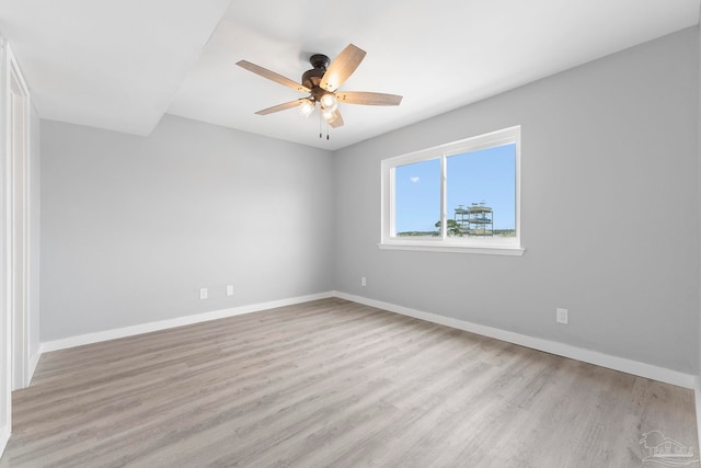 14100 River Rd Unit 223B, Pensacola, FL 32507 - empty room with wood finished floors, a ceiling fan, and baseboards