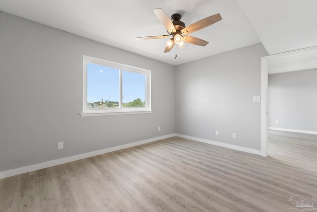 14100 River Rd Unit 223B, Pensacola, FL 32507 - empty room featuring a ceiling fan, wood finished floors, and baseboards