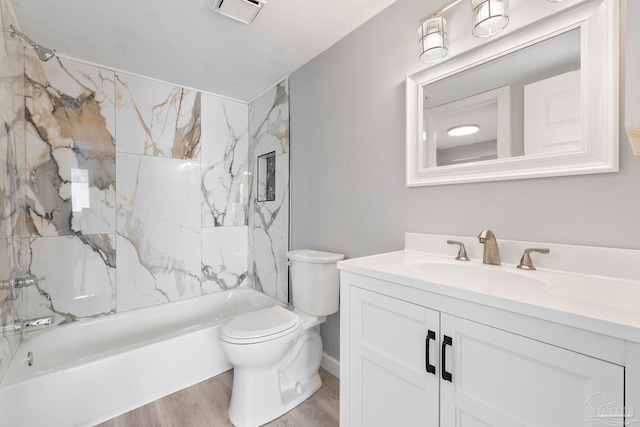 14100 River Rd Unit 223B, Pensacola, FL 32507 - full bathroom with vanity, bathing tub / shower combination, toilet, and wood finished floors