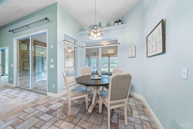 dining room featuring a chandelier