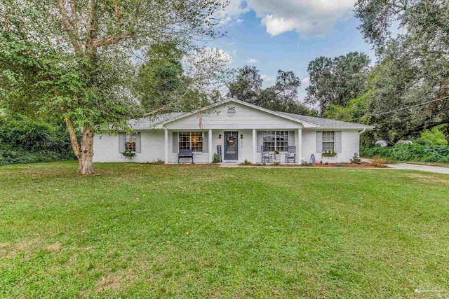 2519 Inda Ave, Pensacola, FL 32526 - ranch-style home with covered porch and a front lawn