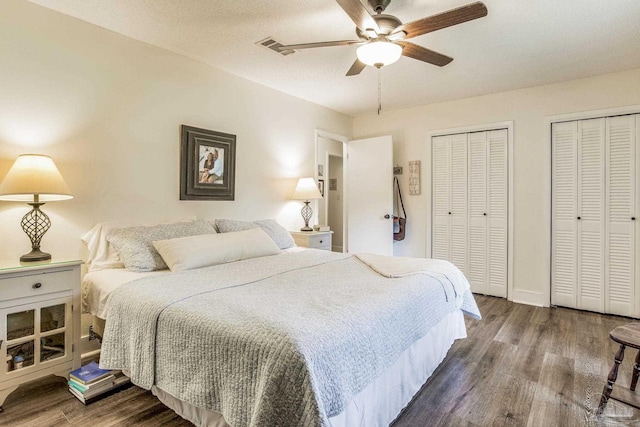 2519 Inda Ave, Pensacola, FL 32526 - bedroom featuring a ceiling fan, visible vents, wood finished floors, baseboards, and multiple closets