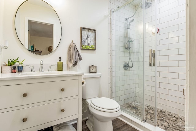 2519 Inda Ave, Pensacola, FL 32526 - full bath featuring vanity, a shower stall, toilet, and wood finished floors