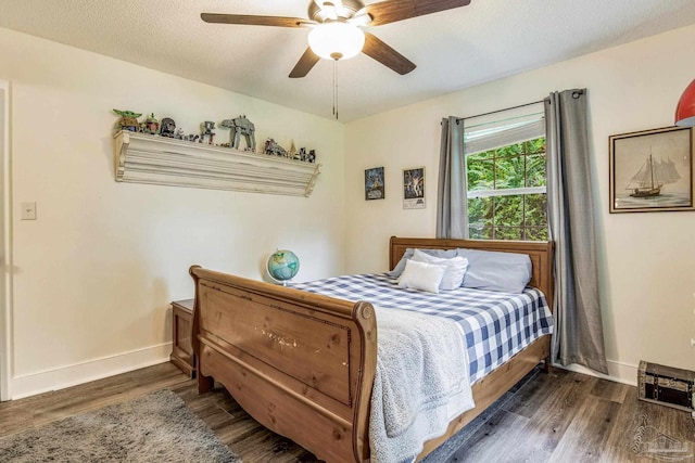 2519 Inda Ave, Pensacola, FL 32526 - bedroom featuring visible vents, baseboards, dark wood-style flooring, ceiling fan, and a textured ceiling