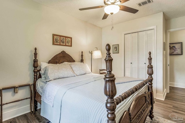 2519 Inda Ave, Pensacola, FL 32526 - bedroom with visible vents, baseboards, wood finished floors, a closet, and a textured ceiling